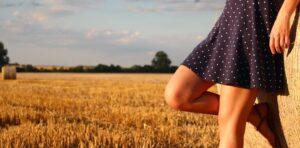 Woman Standing in a Field