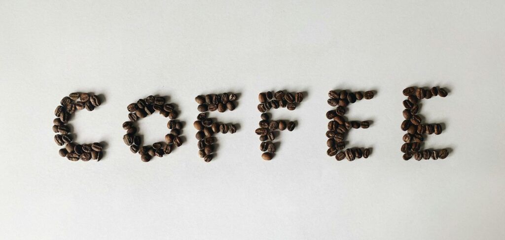 Brown_Coffee_Beans_on_White_Table