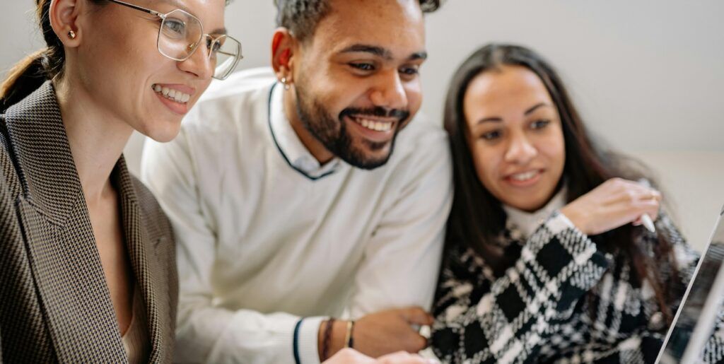 A_Team_Looking_at_Social_Media_from_Laptop