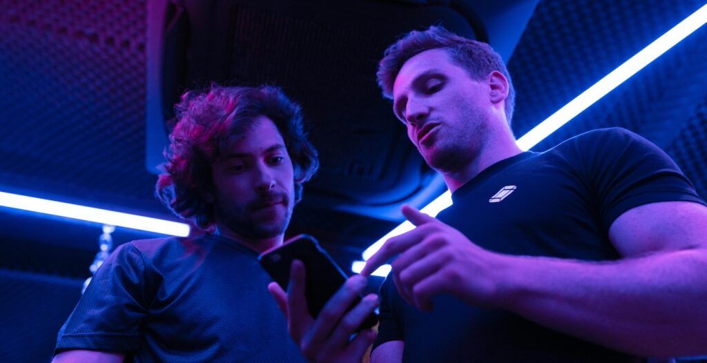 A_Trainer_Looking_at_Smartphone