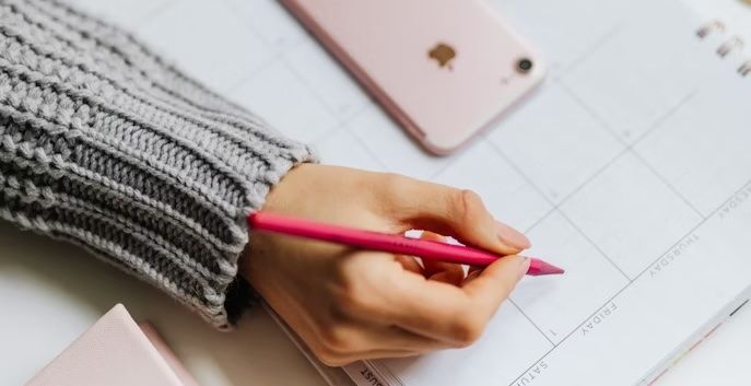 A_Woman_Doing_Content_Calendar_Plan A_Woman_Doing_Content_Calendar_Plan