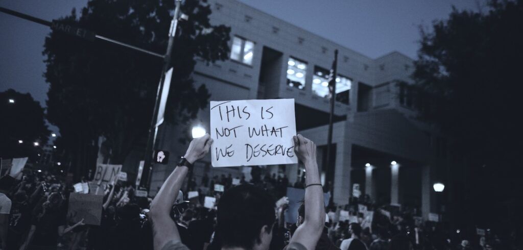 Protesters_Holding_Signs