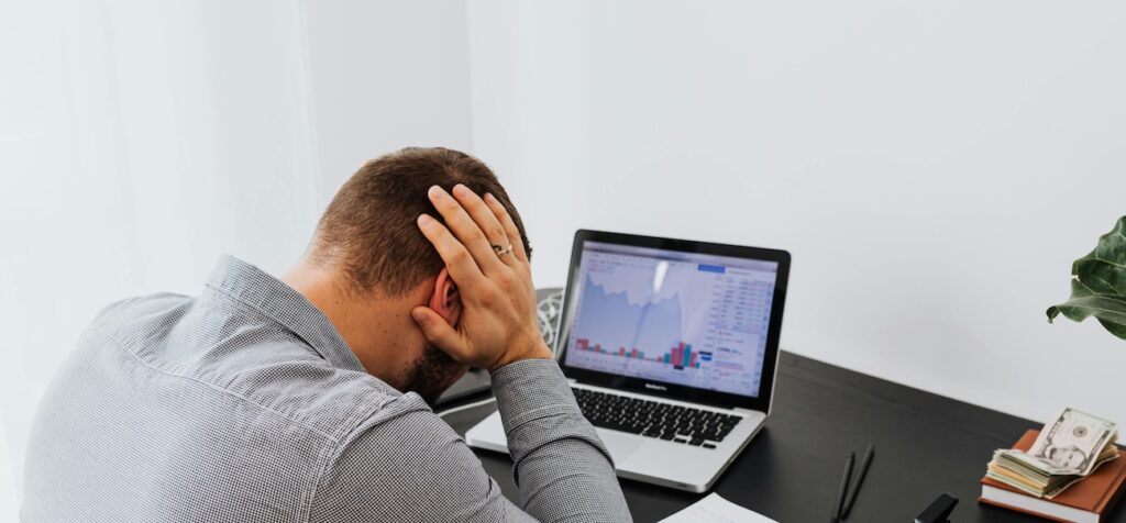 A Man Sitting at the Table with Anxious Feeling