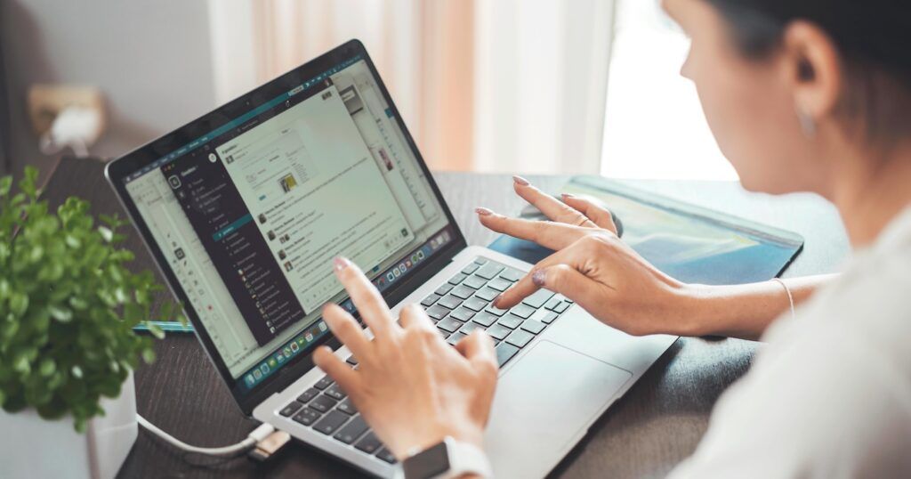 A_Woman_Using_Laptop