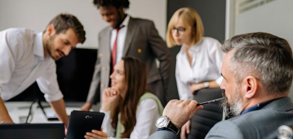 Employee_Having_a_Meeting_in_Meeting_Room Employee_Having_a_Meeting_in_Meeting_Room