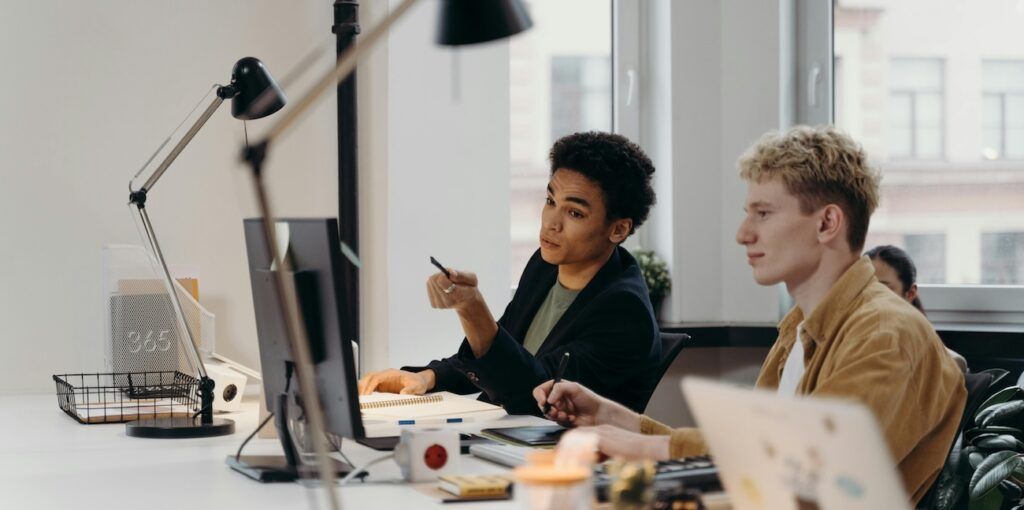 Employee_Sitting_in_front_of_Computer