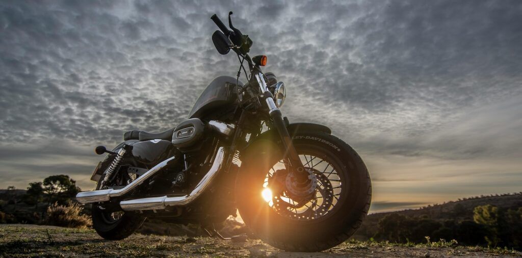 Harley Davidson Forty-Eight 1200 Motorcycle Parked on Dirt Road