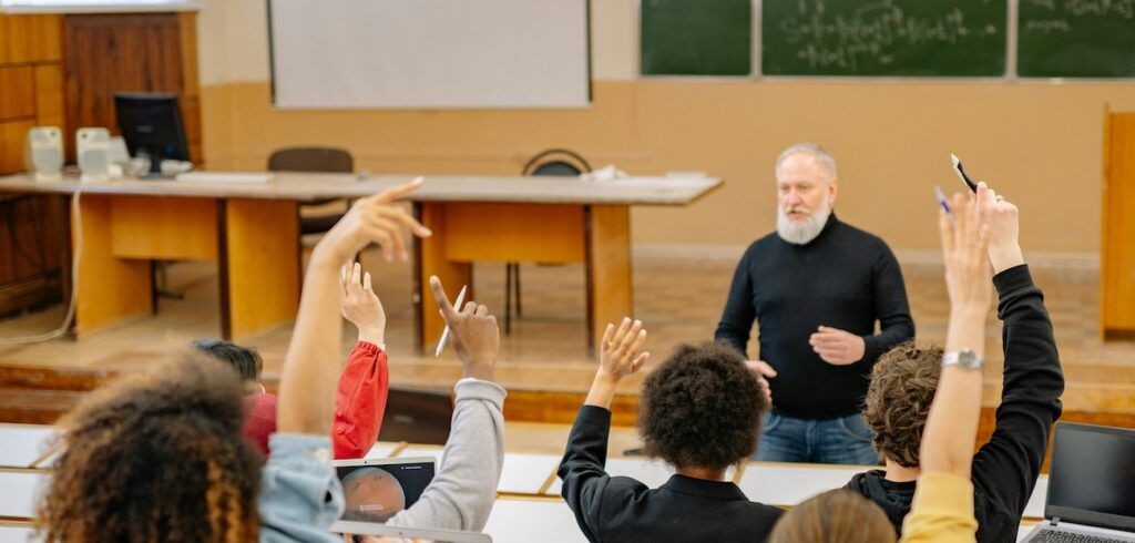 Students Raising Their Hands Students Raising Their Hands