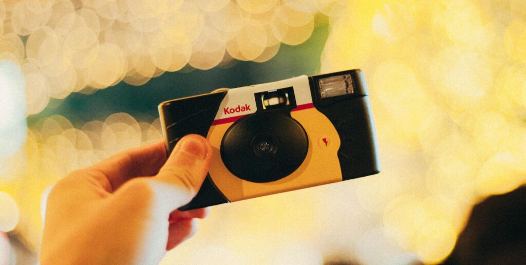 A-Woman-Holding-Kodak-Film-Camera