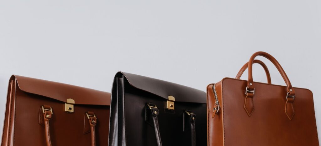 A close-up view of three elegant leather briefcases A close-up view of three elegant leather briefcases