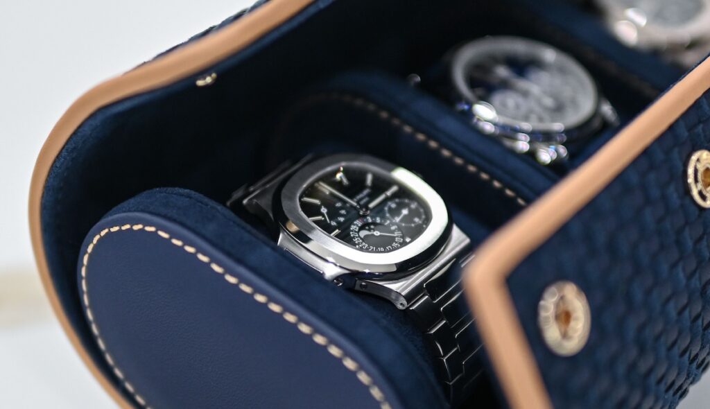 Elegantly designed leather case showcasing classic luxury watches Elegantly designed leather case showcasing classic luxury watches