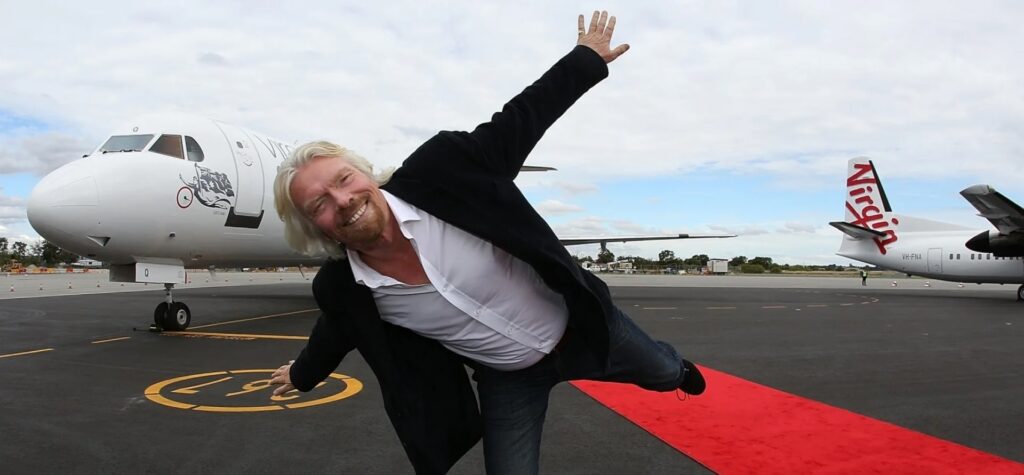 Richard-Branson-Shot-in-front-of-Airplane Richard-Branson-Shot-in-front-of-Airplane