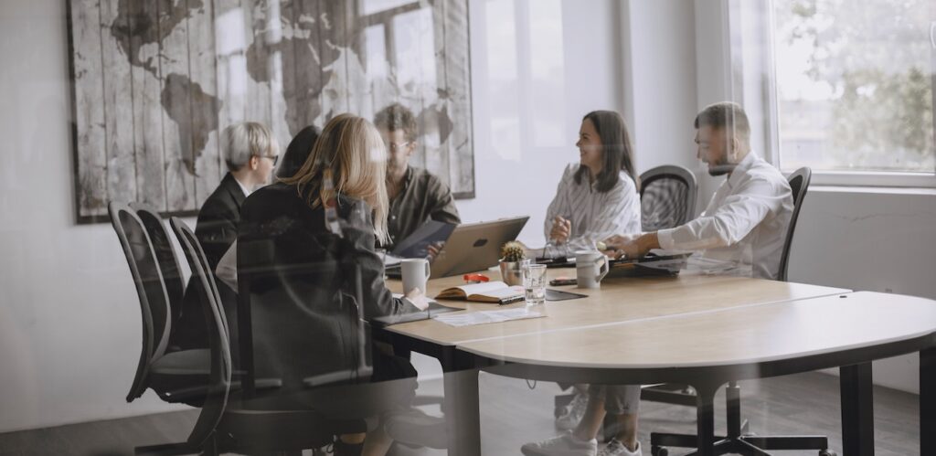 A diverse group of colleagues in a meeting in office