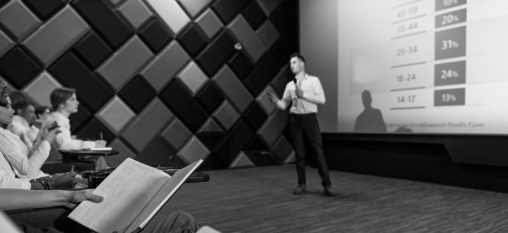 image of a business presentation with an audience