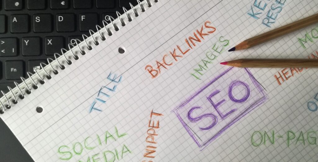 notebook with SEO terms and keywords
