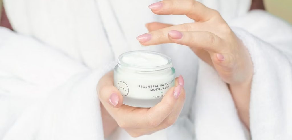 a woman using cream a woman using cream