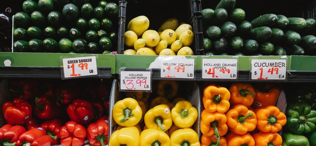 Colorful assortment of fresh vegetables at a supermarket display